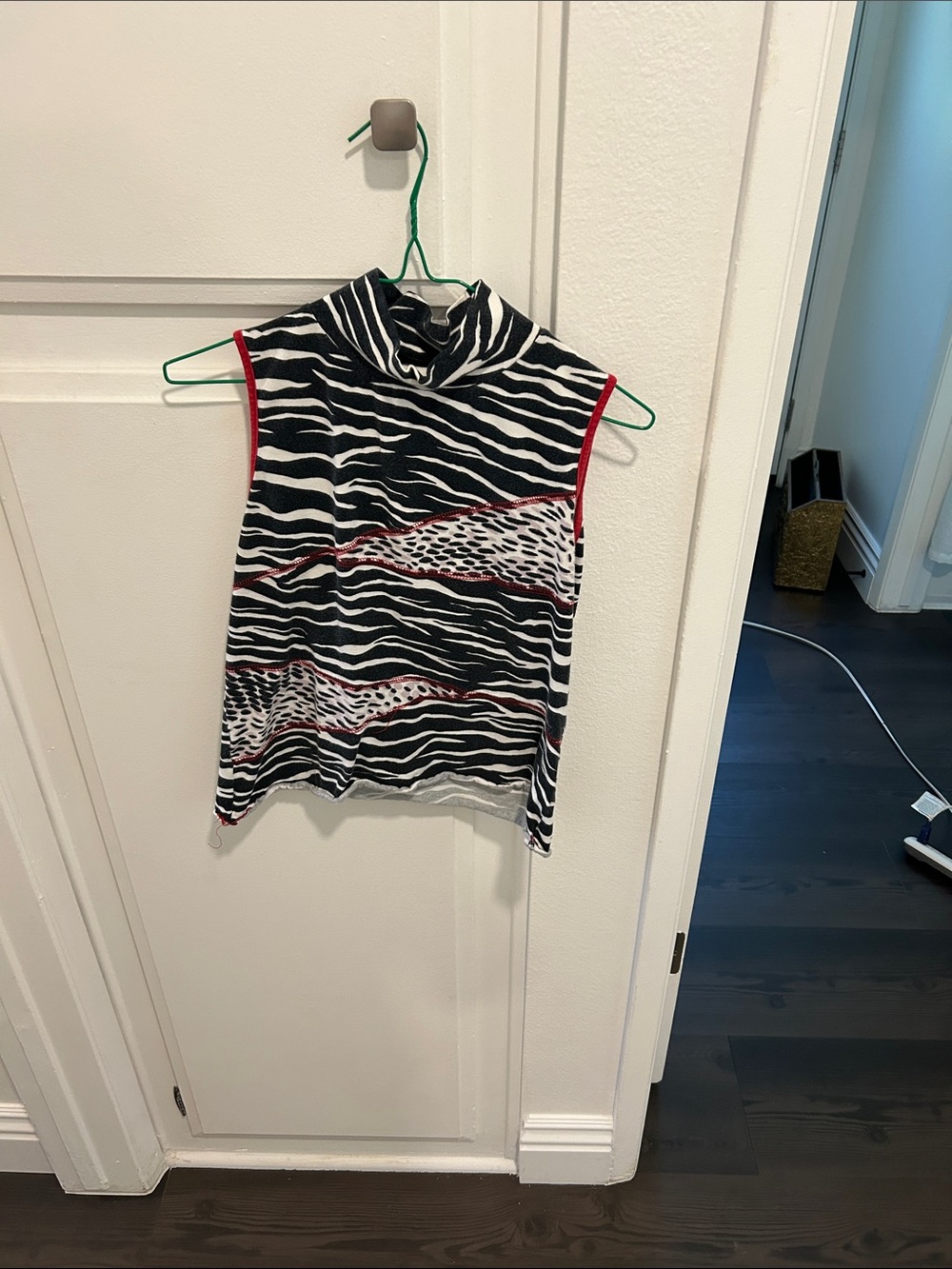 Sleeveless Mock Neck Zebra Print Top with Red Trim